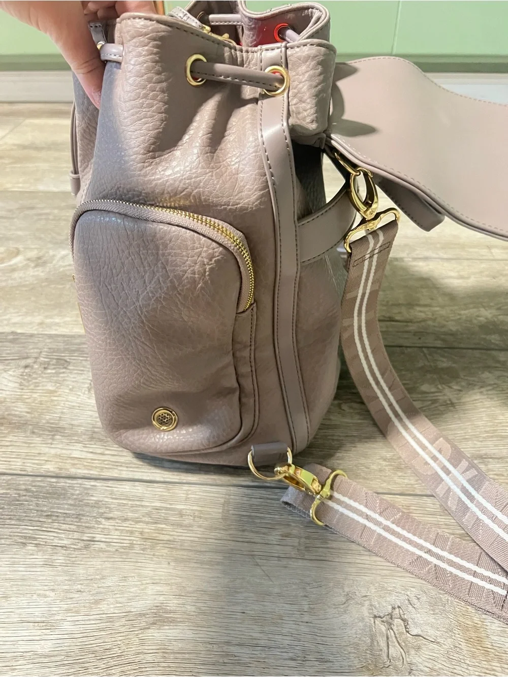 DKNY Mauve-Taupe Leather Drawstring Backpack with Gold Hardware